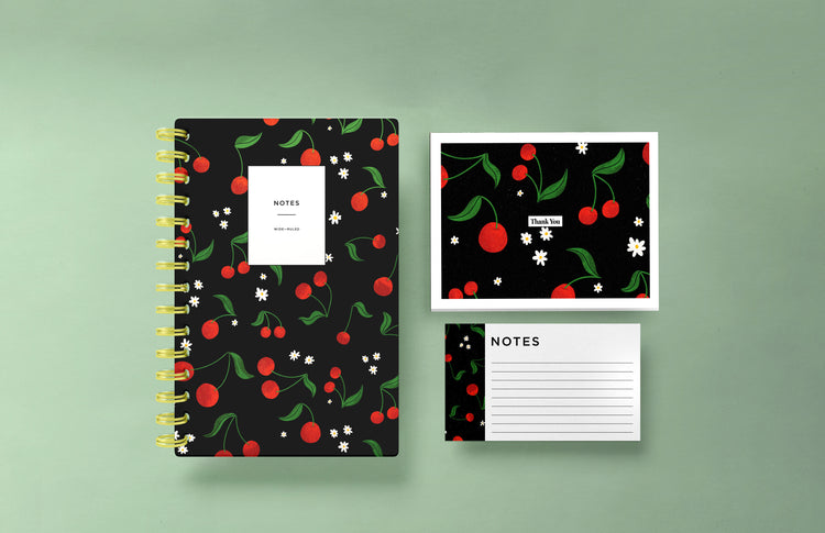 This gift set includes cherry notecards, an A5 hardcover spiral notebook with a blank interior, and a matching set of thank you cards. The cohesive design ties all items together, making it a perfect gift for anyone who appreciates stylish and coordinated stationery