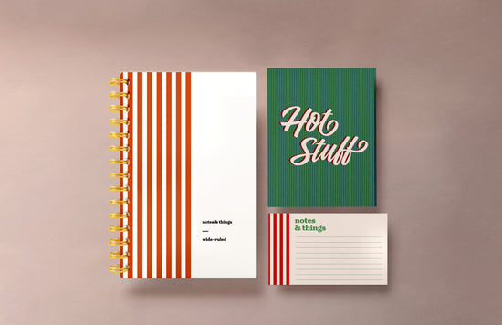 This gift set includes red and white striped notecards, an A5 hardcover spiral notebook with a blank interior, and a matching set of thank you cards. The cohesive design ties all items together, making it a perfect gift for anyone who appreciates stylish and coordinated stationery