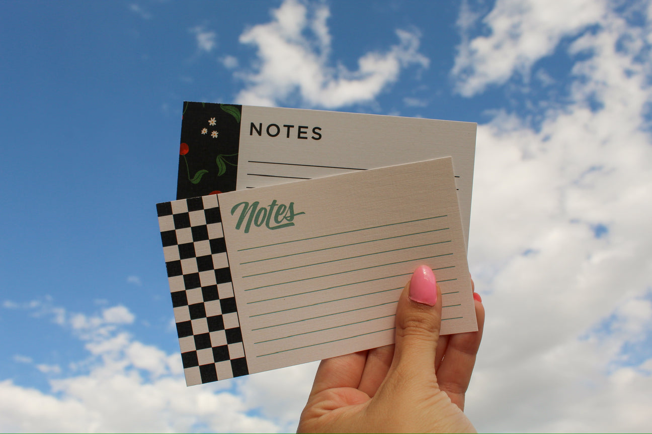 These notecards showcase a classic black and white checkered design. The bold, timeless pattern provides a clean and stylish look, making these cards suitable for any occasion. Perfect for jotting down notes, sending reminders, or writing thoughtful messages, these notecards offer a versatile and sophisticated way to communicate.